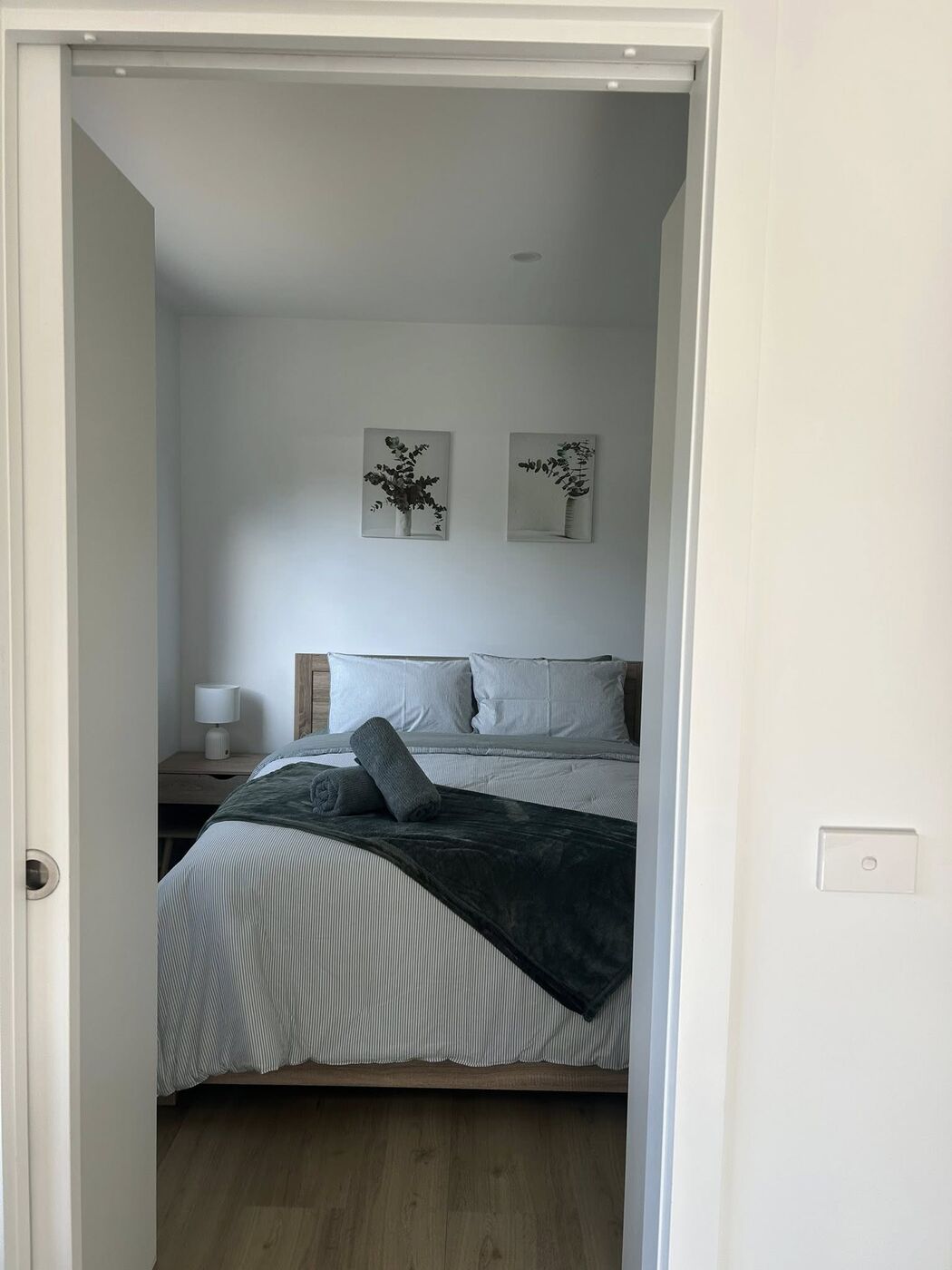 Cabin bedroom viewed through the doorway